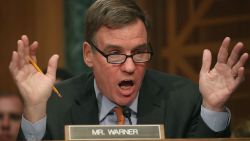 WASHINGTON, DC - OCTOBER 04:  Sen. Mark Warner (D-VA) questions former Equifax CEO Richard Smith during a Senate Banking, Housing and Urban Affairs Committee hearing in the Hart Senate Office Building on Capitol Hill October 4, 2017 in Washington, DC. Smith stepped down as CEO of Equifax last month after it was reported that hackers broke into the credit reporting agency and made off with the personal information of nearly 145 million Americans.  (Photo by Mark Wilson/Getty Images)