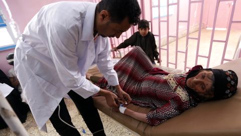 A Yemeni woman suspected of being infected with cholera, receives treatment at a hospital in the capital Sanaa, in August.