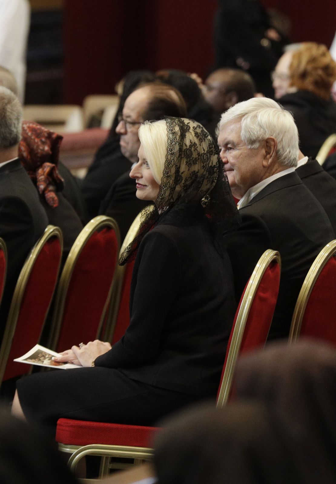 Callista Gingrich, the US ambassador-designate to the Holy See, and her husband, Newt Gingrich, attend a funeral service Thursday for Cardinal Bernard Law at St. Peter's Basilica.