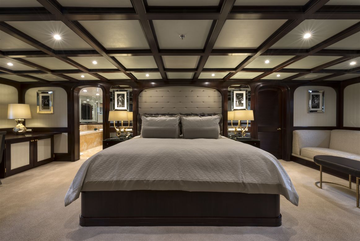 The lower deck Master Suite features leather paneling, mahogany and bronze details, not to mention the mandatory walk-in closet. 