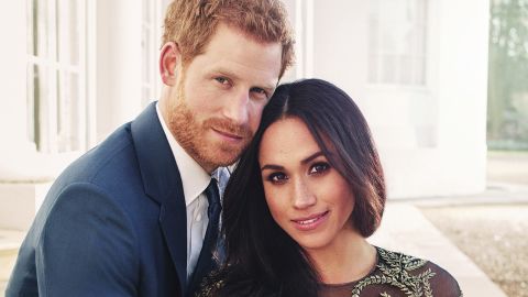 Britain's Prince Harry and Meghan Markle pose for one of two official engagement photos, at Frogmore House, in Windsor.