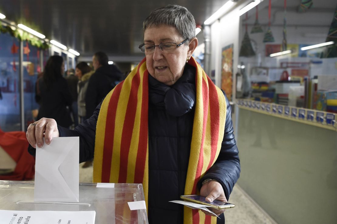 A woman casts her ballot in the Catalan election in Sabadell, north of Barcelona, on Thursday.