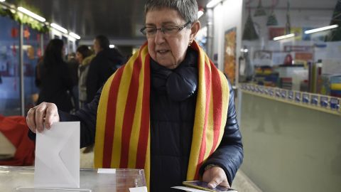 A woman casts her ballot in the Catalan election in Sabadell, north of Barcelona, on Thursday.