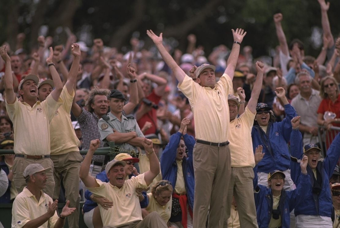 Thomas Bjorn celebrates a European point with his teammates at the 1997 Ryder Cup
