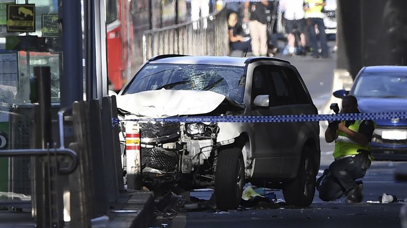 A damaged vehicle is seen at the scene of an <a href="http://www.cnn.com/2017/12/21/asia/melbourne-car-pedestrians-crash/index.html" target="_blank">incident on Flinders Street</a> in Melbourne, Australia, on Thursday, December 21. The driver of the car, who plowed into Christmas shoppers, had a history of drug use and mental health issues, police said. Eighteen people were injured, including at least one  child.