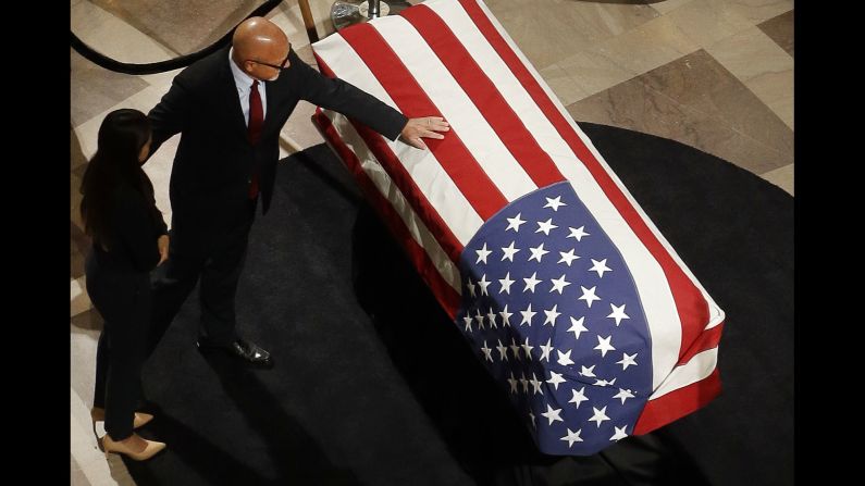 Steve Kawa, former chief of staff to San Francisco Mayor Edwin Lee, places his hand on the casket containing the body of Lee in the San Francisco City Hall rotunda in San Francisco on Friday, December 15. Lee, a former civil rights attorney who became the first Asian-American to serve in the city's top post, <a href="http://www.cnn.com/2017/12/12/politics/ed-lee-san-francisco/index.html" target="_blank">died early Tuesday, December 12</a>,  after suffering a heart attack just days before. <a href="http://www.cnn.com/2017/12/14/world/gallery/week-in-photos-1215/index.html" target="_blank">See last week in 29 photos</a>