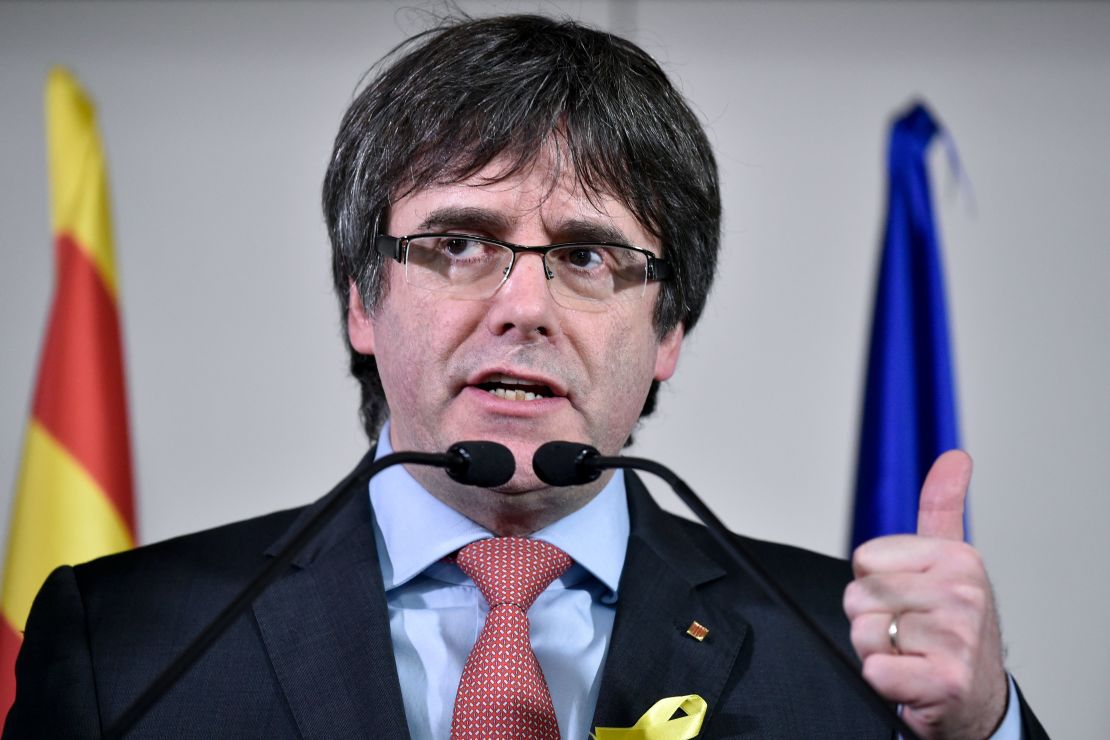 Former Catalan President Carles Puigdemont welcomes the election results in a speech from Brussels, Belgium.