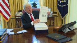president trump signs tax bill 12-22-2017