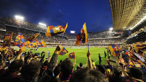 Barcelona fans cheer their team during the Copa del Rey against Real 
