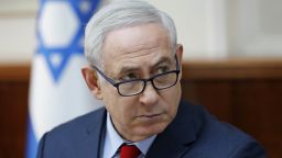 Israeli Prime Minister Benjamin Netanyahu attends the weekly cabinet meeting at his office in Jerusalem, Israel, Sunday Dec. 17, 2017. (Abir Sultan/Pool via AP)