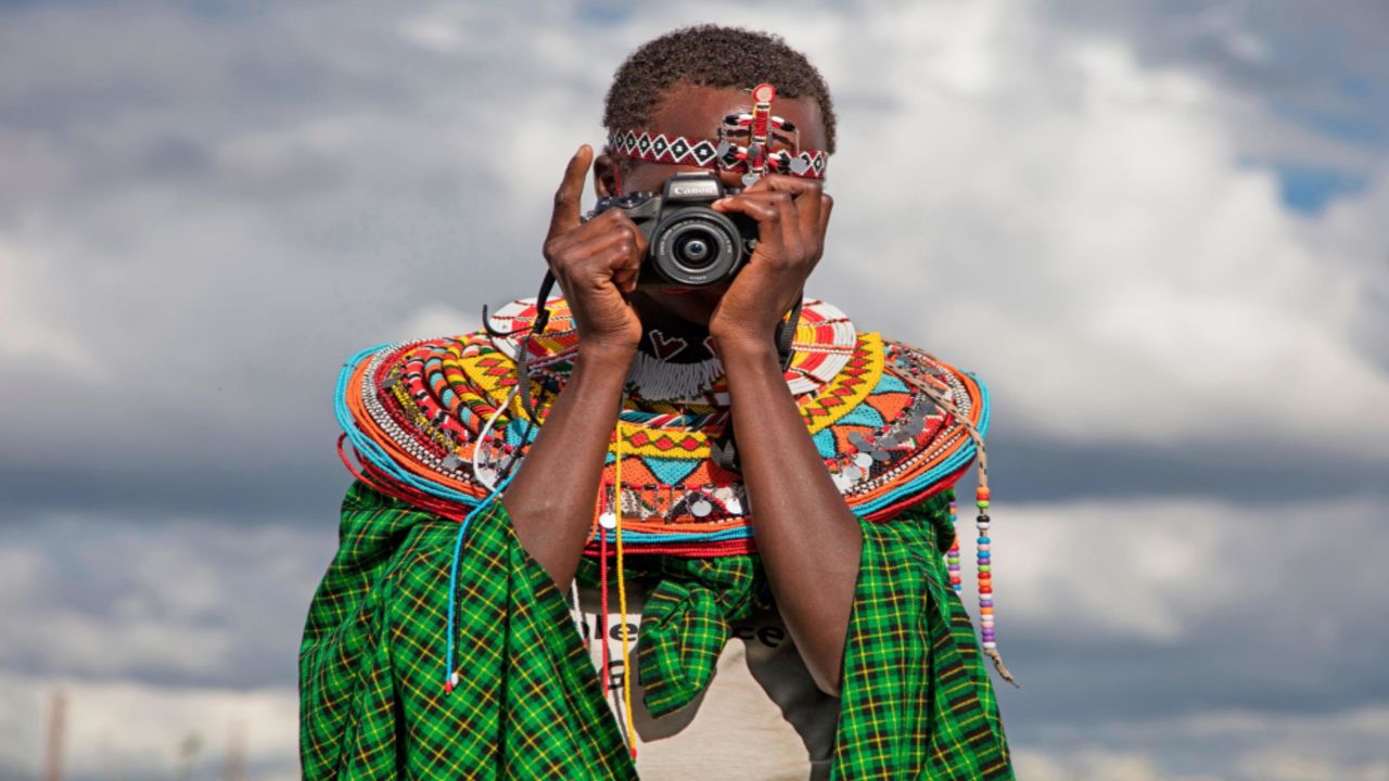 Anita, 15, takes a photo during the Tehani Photo Workshop, which was held earlier this year for 18 Kenyan girls who escaped child marriage. (Stephanie Sinclair/Too Young to Wed)