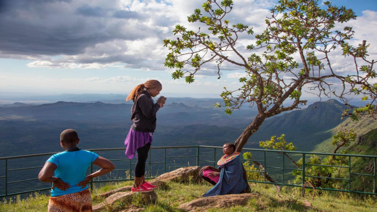Student mentor Eunice, 15, photographs Mary, 16, during the workshop. (Stephanie Sinclair/Too Young to Wed)
