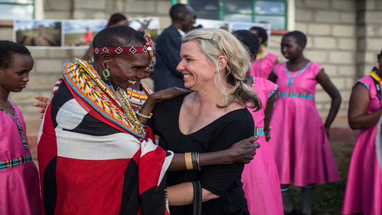 Too Young to Wed founder Stephanie Sinclair greets one of the girls' mothers at the end of the photo workshop in Kenya. (Nichole Sobecki/Too Young to Wed)