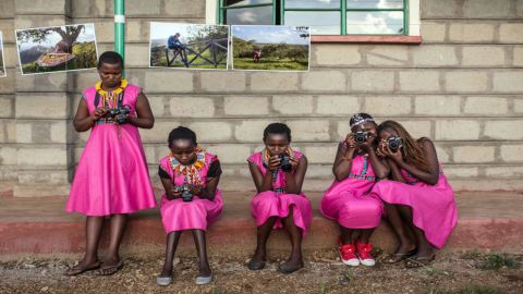 Students participate in the community exhibition at the end of the Tehani Photo Workshop in Kenya. (Nichole Sobecki/Too Young to Wed)