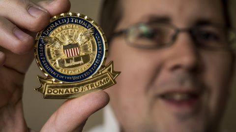 John Wertman, a coin collector, with his Trump "challenge coin" on December, 21, 2017 in Burke, VA.