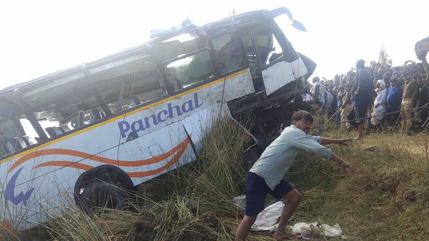 The pilgrims' bus is pulled from the Banas River after the fatal accident in Sawai Madhopur, India, on Saturday.