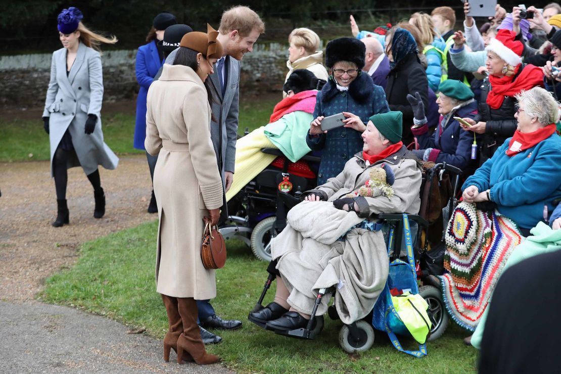 Meghan Markle and Prince Harry meet well-wishers outside the church.
