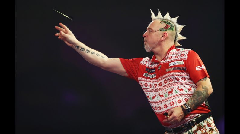 Scotland's Peter Wright competes at the William Hill World Darts Championships in London, England, on Thursday, December 21.