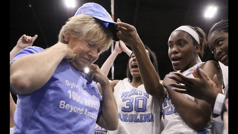 North Carolina coach Sylvia Hatchell is greeted by her players after their 79-63 win over Grambling State in an NCAA basketball game in Myrtle Beach, South Carolina, on Tuesday, December 19. Hatchell earned her 1,000th career victory.