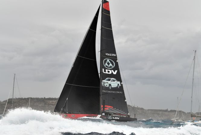 Supermaxi yacht Comanche held the lead at the end of the first day's racing, edging out Wild Oats after the two boats locked horns leaving the harbor. 