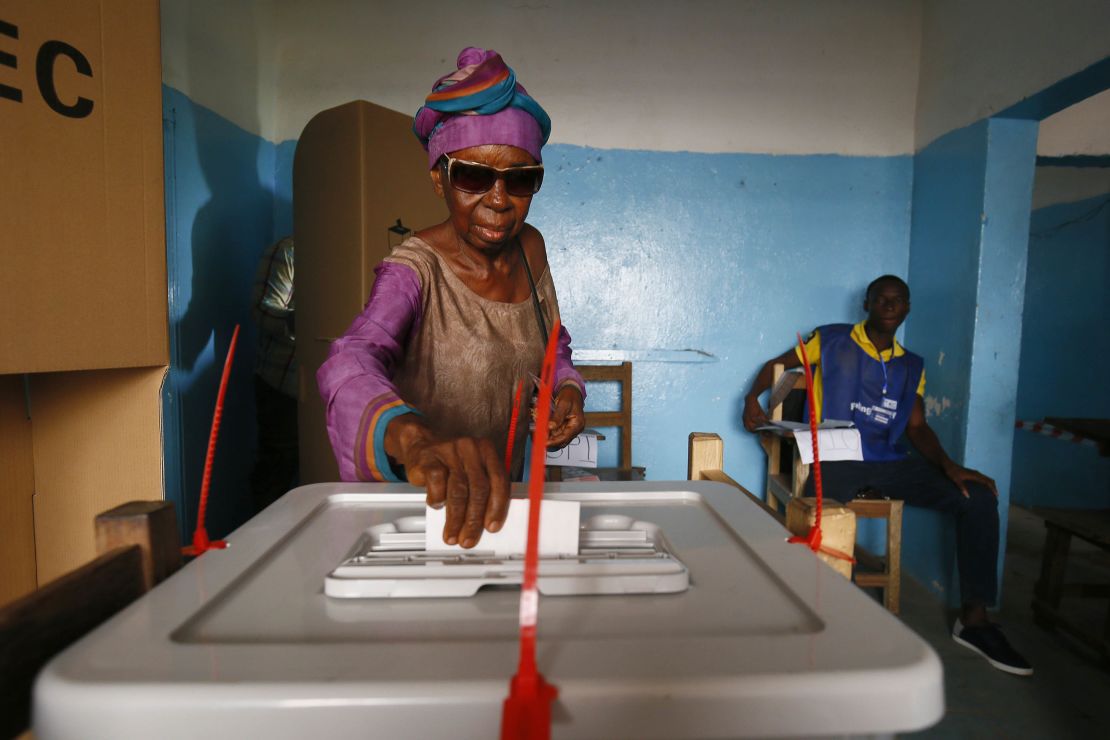 A voter casts her ballot in Monrovia, the capital of Libera.