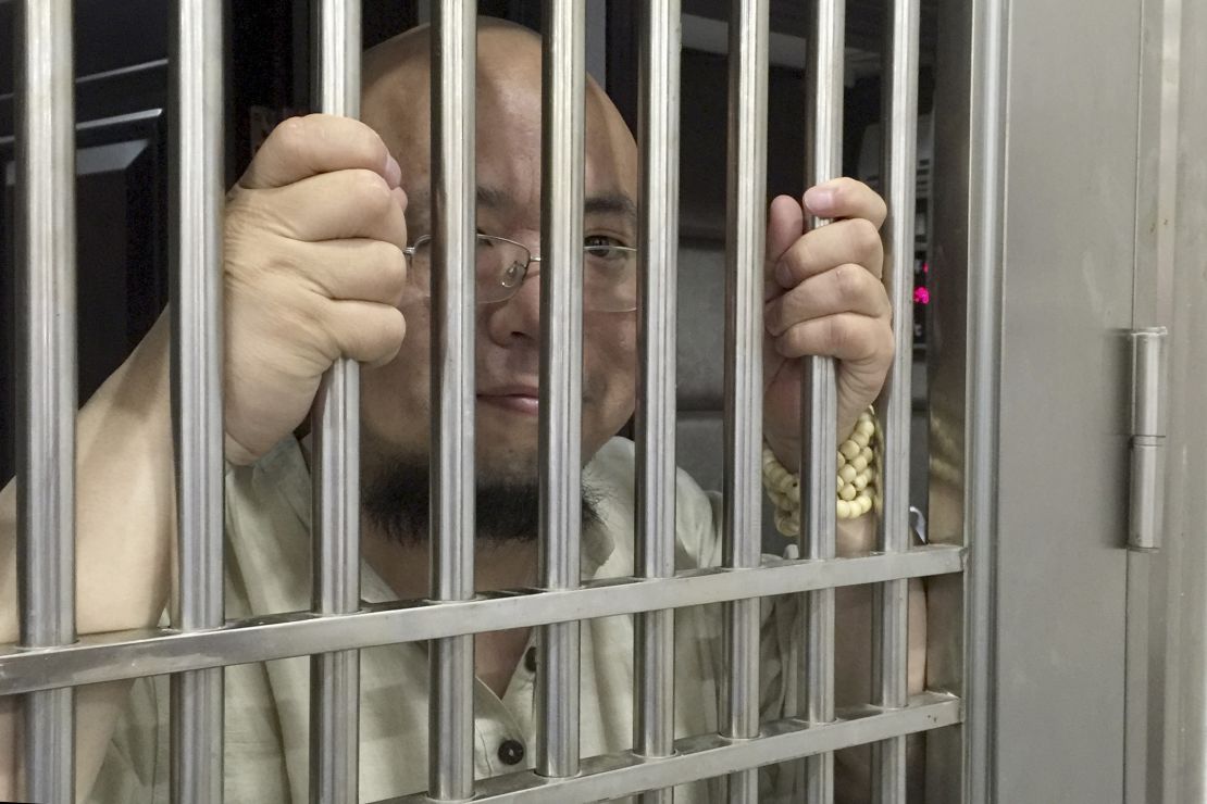 Wu Gan, also known as the Super Vulgar Butcher, seen behind bars at a police station in Nanchang city in eastern China's Jiangxi province in 2015.