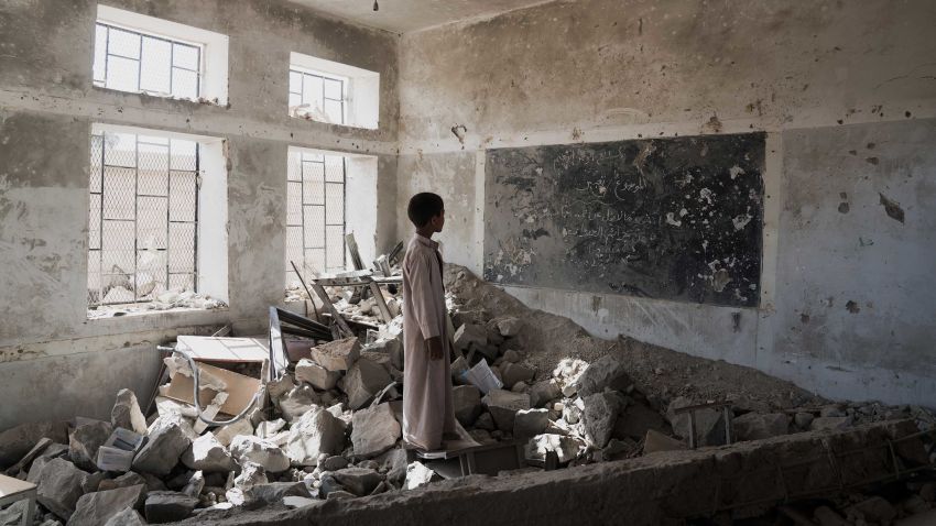 A student stands in the ruins of one of his former classrooms, which was destroyed in June 2015, at the Aal Okab school in Saada, Saada Governorate, Yemen, Monday 24 April 2017. Students now attend lessons in UNICEF tents nearby,

Since the start of 2017, the humanitarian situation in Yemen has substantially deteriorated. According to analysis by the Humanitarian Country Team released in April 2017, the number of people in need of assistance and protection is 20.7 million. Increasing tensions and hostilities in the western coast since January have left over 50,000 people displaced, many of them in locations where humanitarian access has been extremely challenging. Concerns regarding the continuity of operations of the Al Hudaydah port persist and the potential closure of the main port in Yemen would have significant consequences for the humanitarian operation.

Between April and July 2017, 400,000 cases of suspected cholera and nearly 1900 associated deaths were recorded. Vital health, water and sanitation facilities have been crippled by more than two years of hostilities, and created the ideal conditions for diseases to spread. Nearly 2 million Yemeni children are acutely malnourished, which makes them more susceptible to cholera. Vital infrastructure, such as health and water facilities, have been damaged or destroyed by the conflict. Adding to the pressure on health services, more than 30,000 health workers have not been paid their salaries in more than 10 months.

Yemen's education system is also on the brink of collapse, and more than 5 million children risk being deprived of their right to education. As at June 2017, over 193,000 teachers have not received their salaries during the past nine months. Moreover, school infrastructure has been affected, with 222 incidents of attacks on schools documented and verified by the Country Task Force on Monitoring and Reporting of Grave Child Rights Violations (CTF MR) between March 2015 and June 2017. At least 1,279