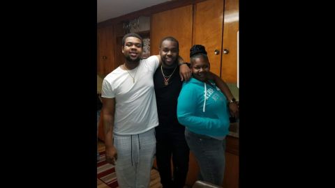 From left, Marquise Byrd, his brother and their mother. Byrd was 22.
