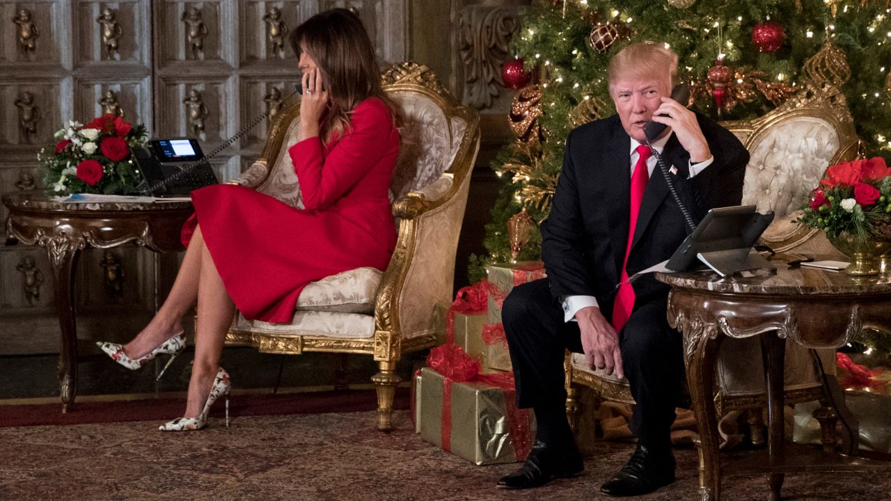 First lady Melania Trump and President Donald Trump make phone calls to children around the United States on Christmas Eve from their Mar-a-Lago estate in Palm Beach, Florida.