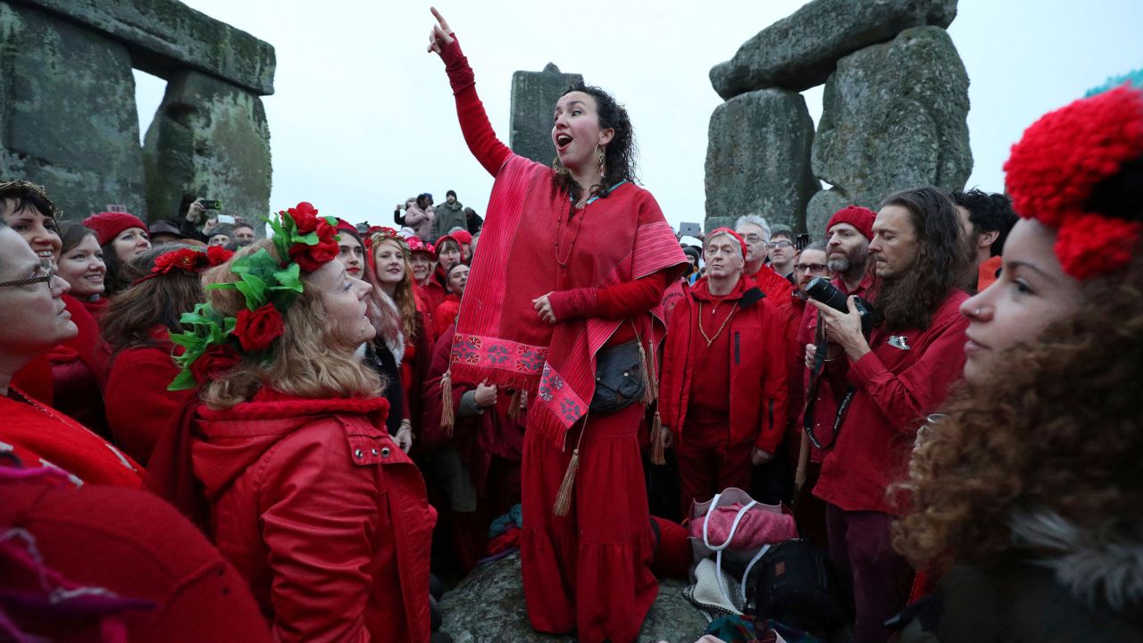 People gather at Stonehenge in Wiltshire, England, on December 22 to celebrate the winter solstice and to witness the sunrise after the longest night of the year.