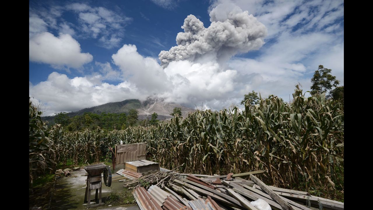 The volcano Sinabung emits an avalanche of hot clouds in Karo, Indonesia, on December 27. 