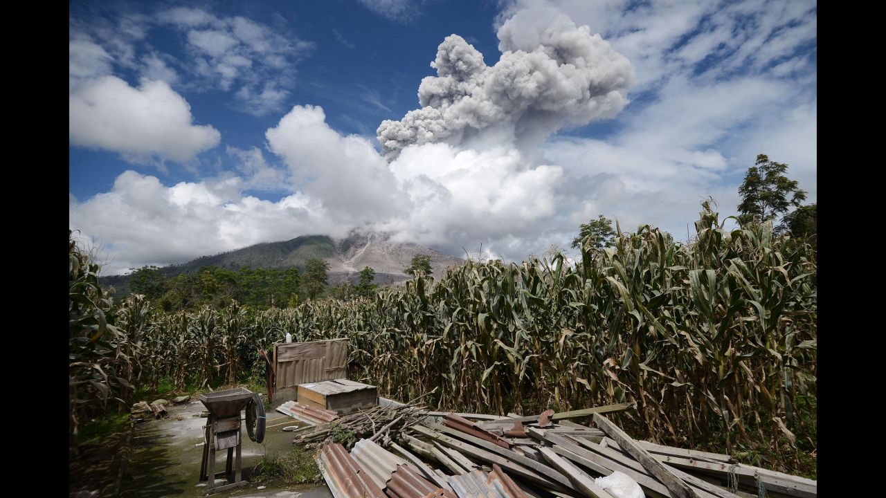 The volcano Sinabung emits an avalanche of hot clouds in Karo, Indonesia, on December 27.