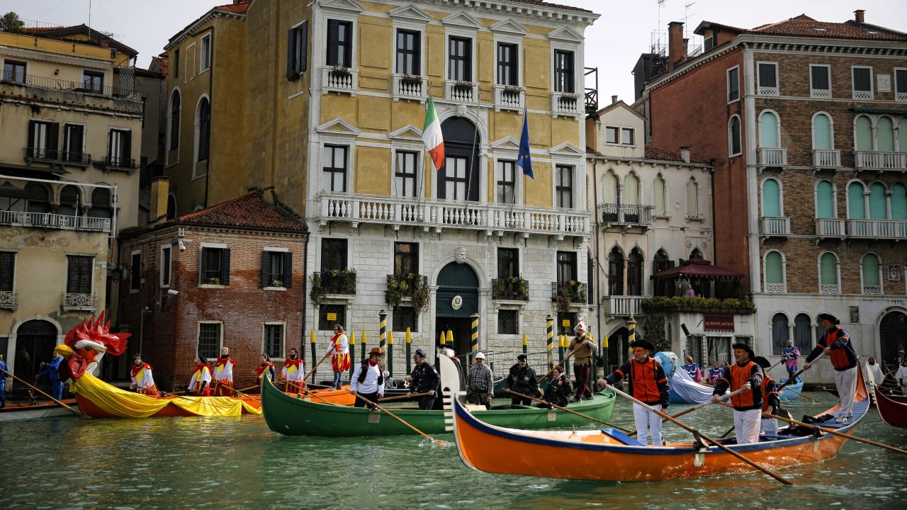 <strong>February in Venice, Italy: </strong>A masquerade parade makes its way down Grand Canal during Carnival. Venice is rather cold this time of year for the most part, so pack accordingly.