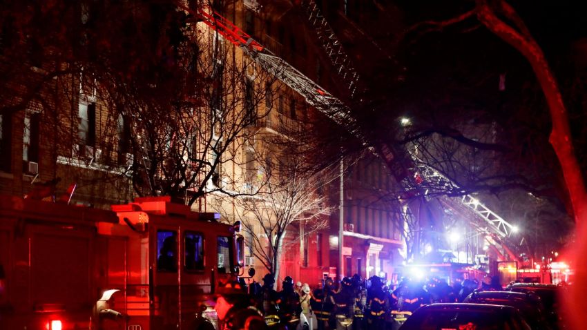 Firefighters respond to a building fire Thursday, December 28 in the Bronx borough of New York. The Fire Department of New York says a blaze raging in the Bronx apartment building has seriously injured more than a dozen of people.