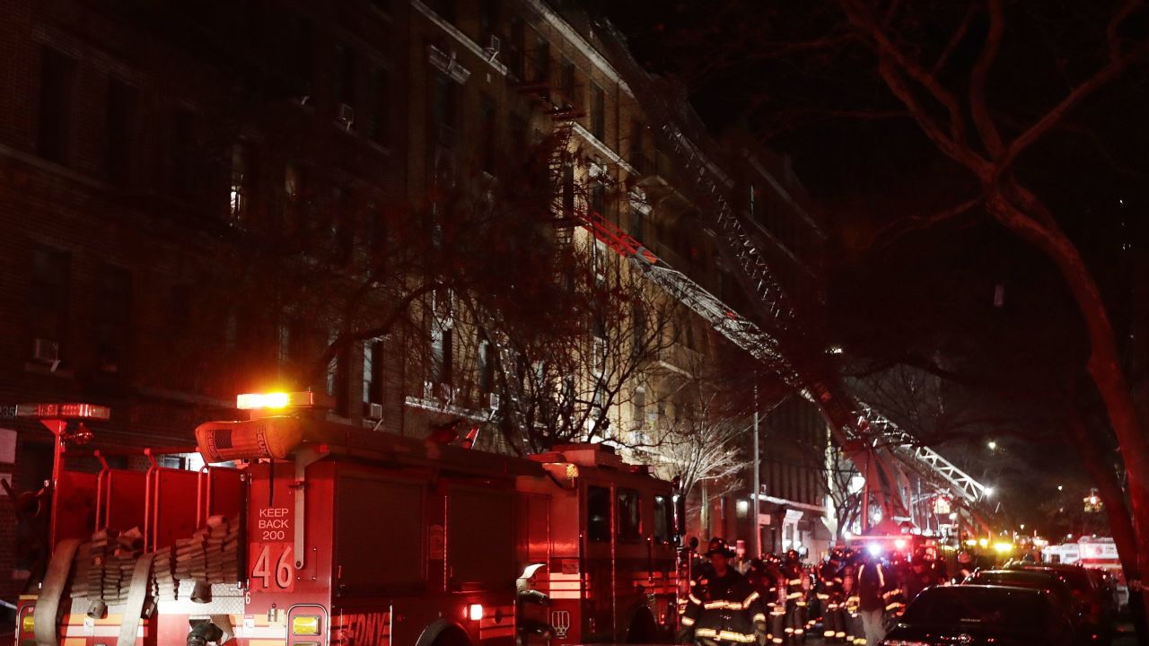 Firefighters respond to a building fire Thursday, December 28, in the Bronx borough of New York. 