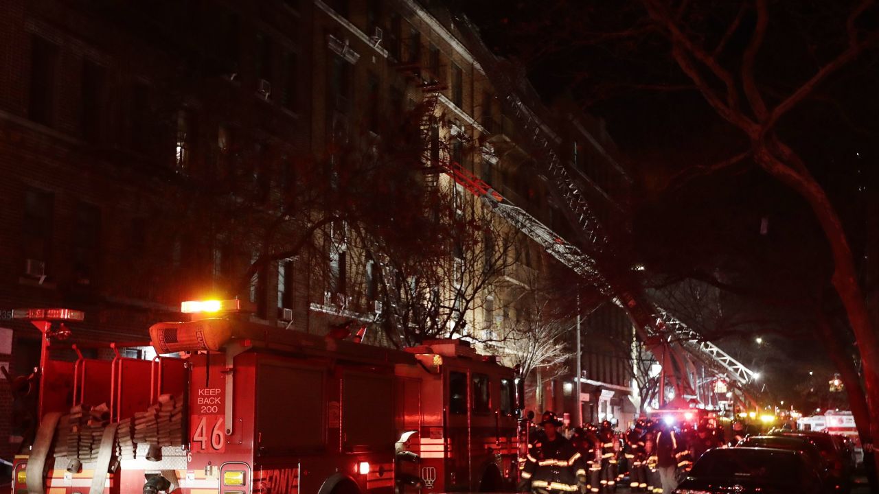 Firefighters respond to a building fire Thursday, December 28, in the Bronx borough of New York.