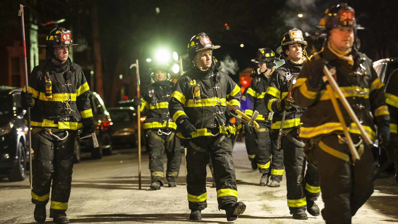 Firefighters leave after putting out the fire.
