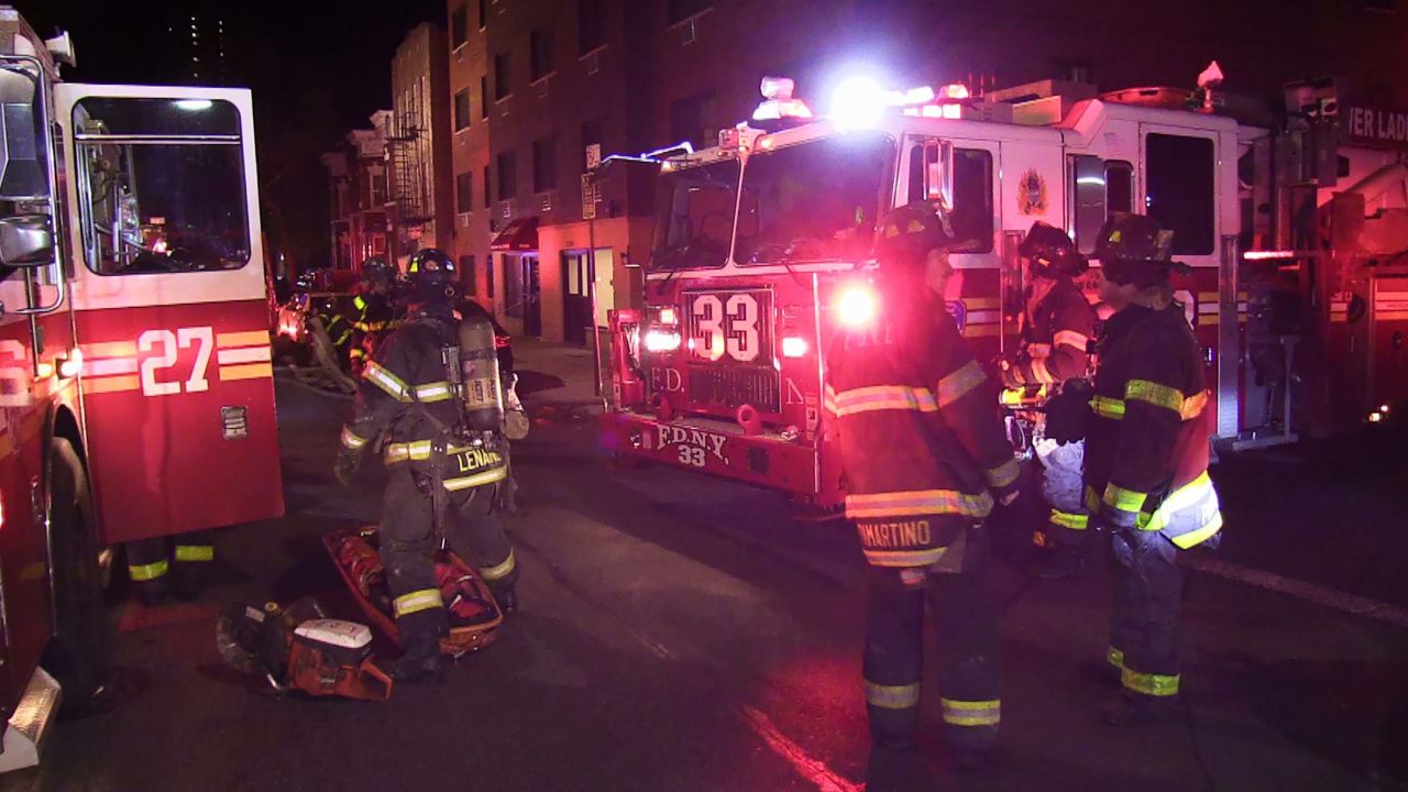 Firefighters operate at scene of the blaze.