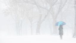 RESTRICTED BOSTON, MA - DECEMBER 25: A Christmas Day snowstorm creates whiteout conditions at the Boston Common on Dec. 25, 2017. (Photo by Dina Rudick/The Boston Globe via Getty Images)