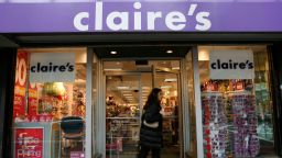 UNITED STATES - DECEMBER 01:  A woman exits a Claire's store on Friday, December 1, 2006 in New York. Claire's Stores Inc., the retailer of jewelry for teens, said it hired Goldman Sachs Group Inc. to help it explore a possible sale of the company.  (Photo by Daniel Acker/Bloomberg via Getty Images)