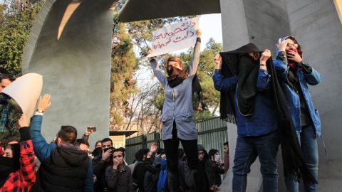 Students protest Saturday at the University of Tehran.
