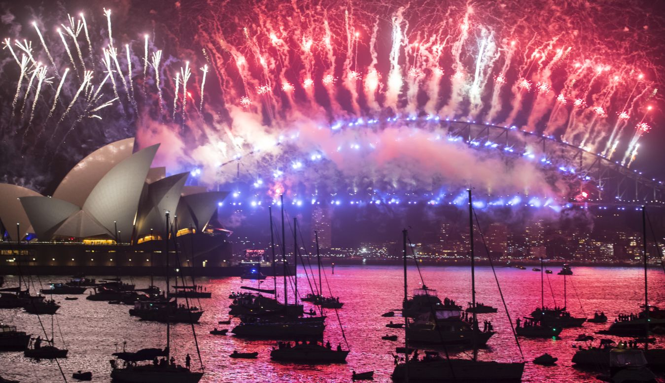 New Year's fireworks are seen above the Opera House and Harbour Bridge in Sydney, Australia. Over a million people gathered around the harbor to watch the 12-minute celebration for the start of 2018.