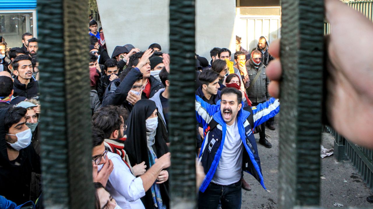Iranians march against the high cost of living in Tehran.