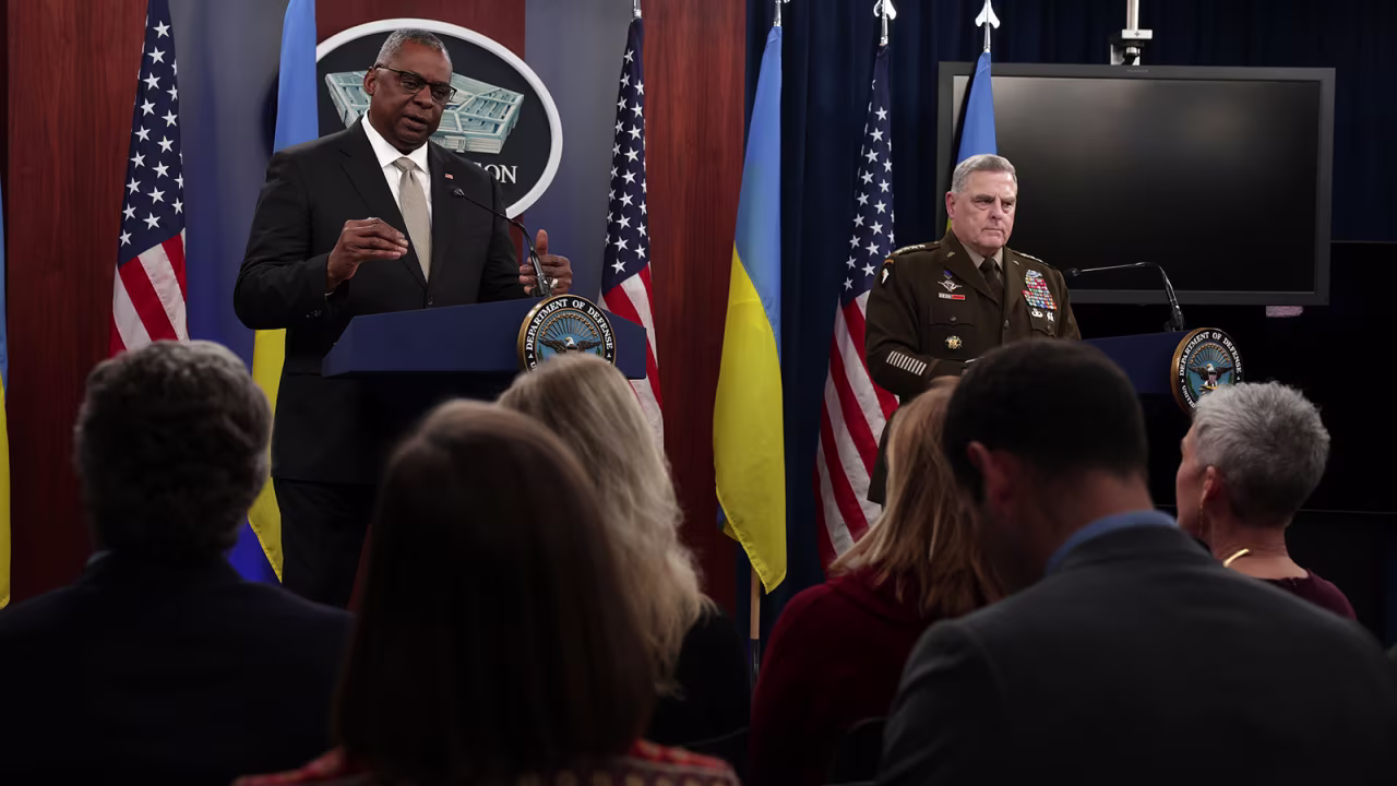 US Secretary of Defense Lloyd Austin, left, and Chairman of the Joint Chiefs of Staff Gen. Mark Milley speak to members of the press at the Pentagon on November 16 in Arlington, Virginia. 
