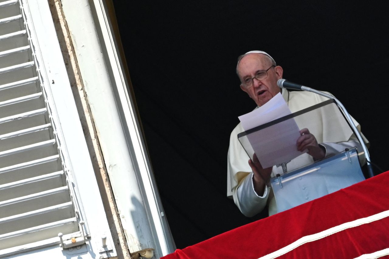 Pope Francis delivers the Sunday Angelus prayer from the window of his study overlooking St. Peter's Square at the Vatican.