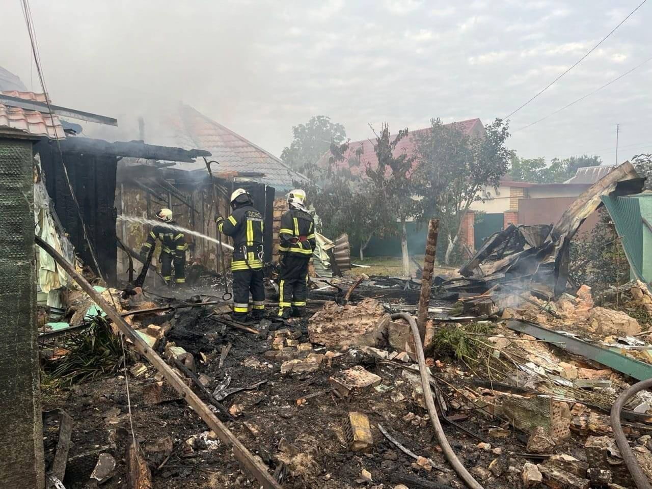 Rescuers work at a site of buildings damaged in the night by Russian drone and missiles strike in Kyiv region, Ukraine on August 30.