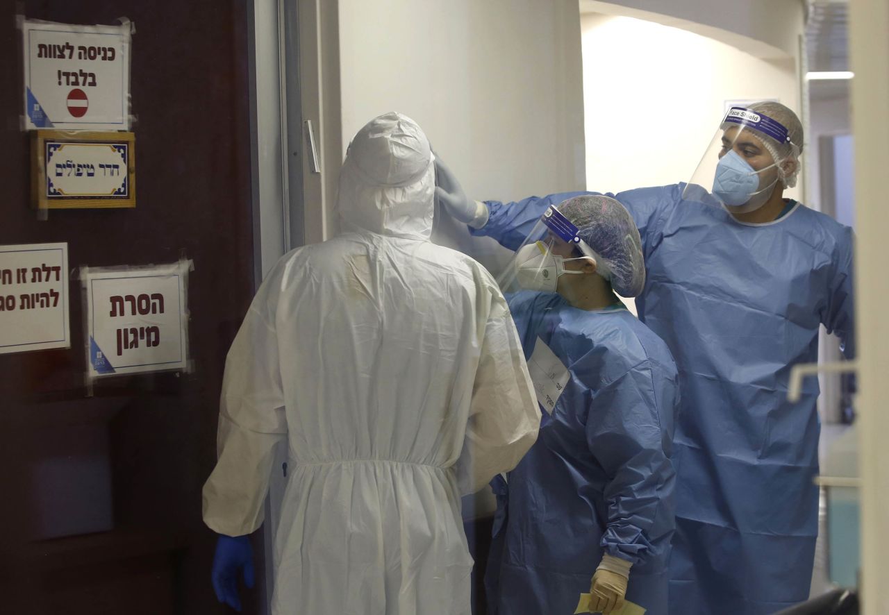 Medical staff work in the Covid-19 isolation ward at Hadassah Ein Kerem Hospital in Jerusalem, on September 30.