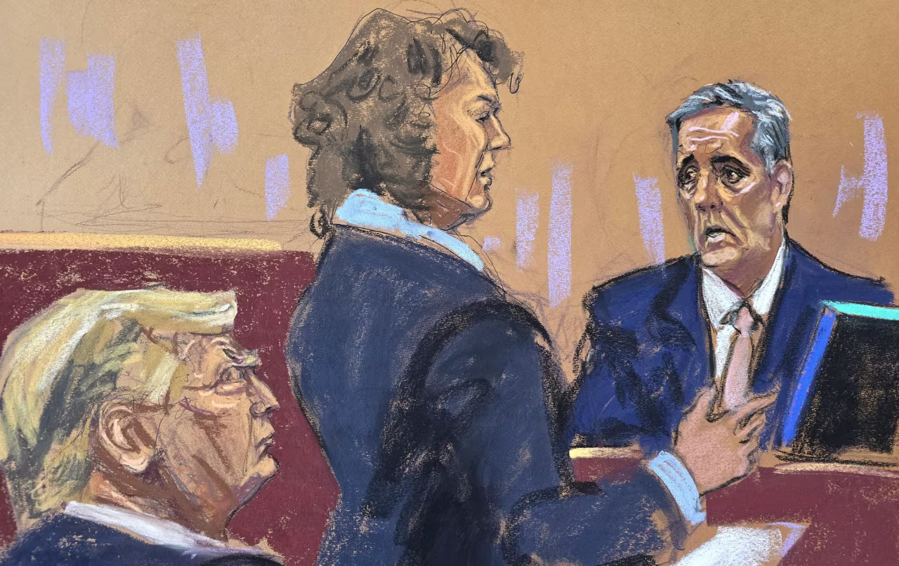 Michael Cohen answers questions from prosecutor Susan Hoffinger on Monday.