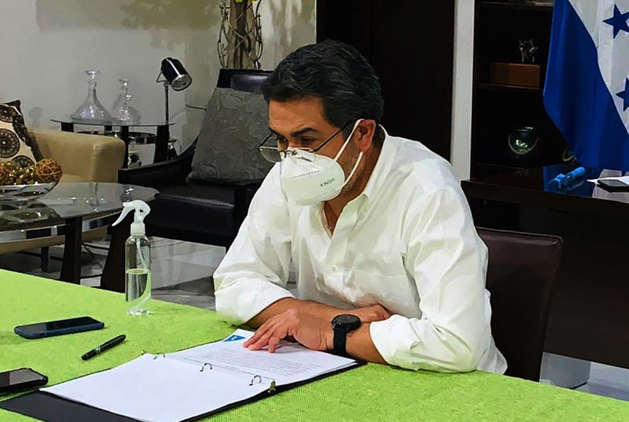 Honduran President Juan Orlando Hernandez wears a face mask in Tegucigalpa, Honduras on June 15.  