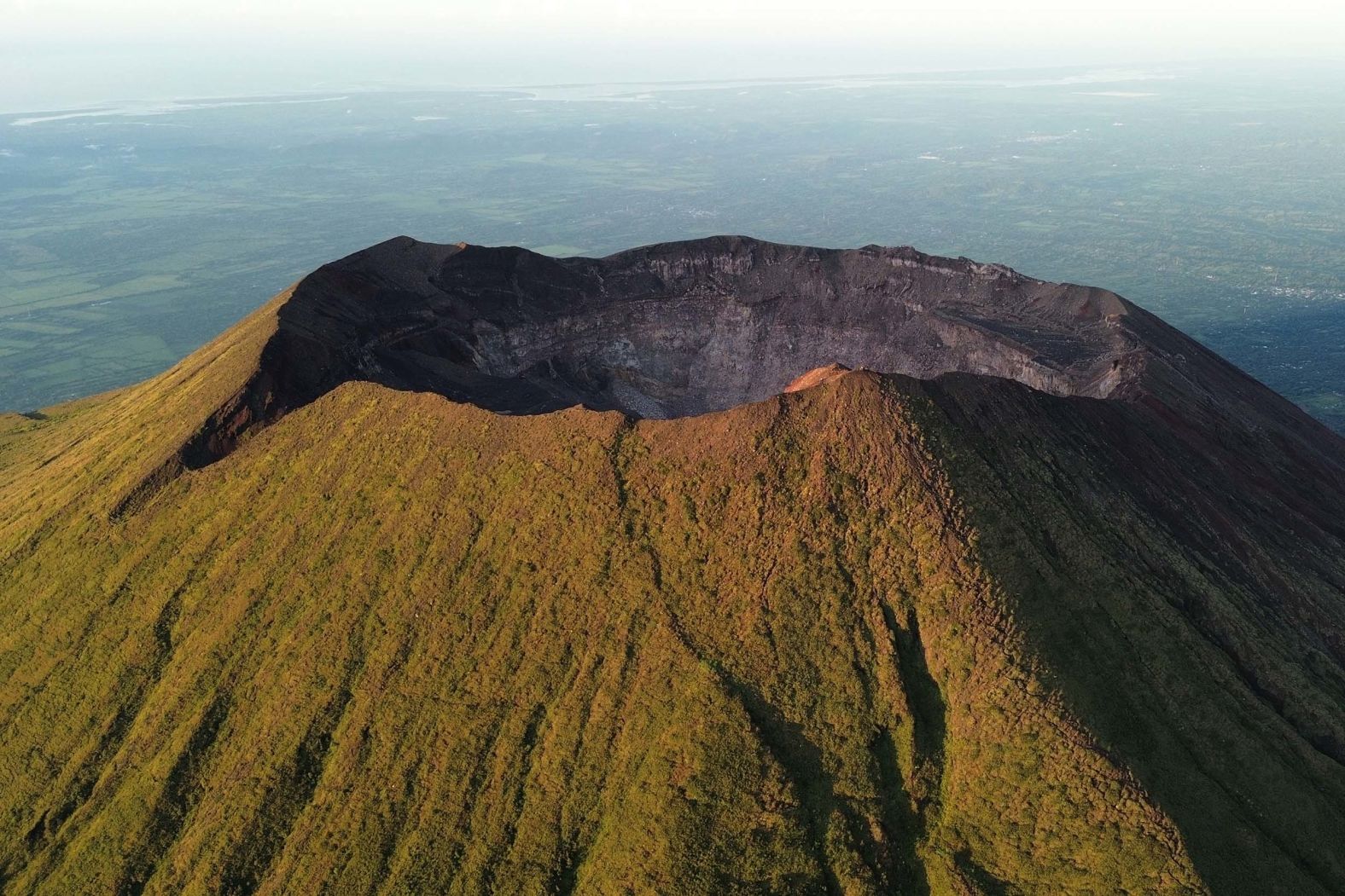 This aerial photo, taken on Sunday, November 2, shows the crater of the Chaparrastique volcano in San Miguel, El Salvador. It is one of 36 volcanic structures in the country that are considered active, according to the Ministry of Environment and Natural Resources.